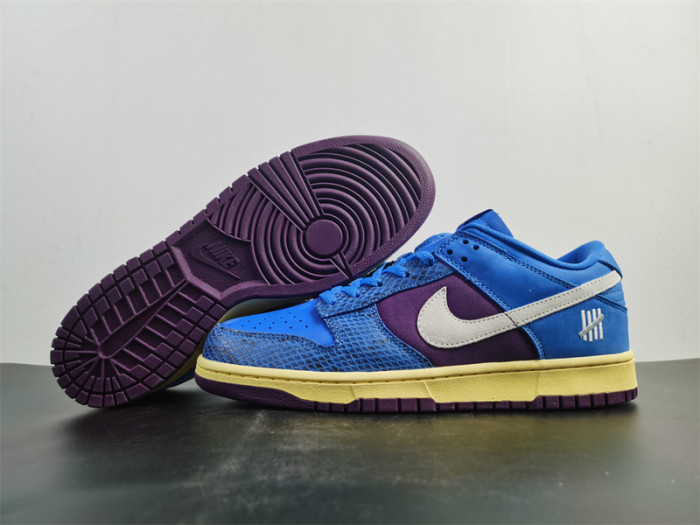 undefeated’s “dunk vs. af-1” collection grows with this snakeskin-dressed   dh6508-400